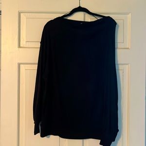 Free People waffle top falls off the shoulder.
